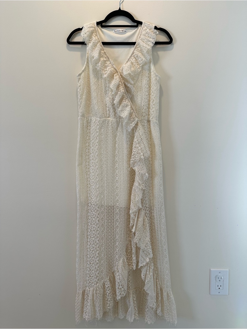 White lace maxi dress with ruffles and tie